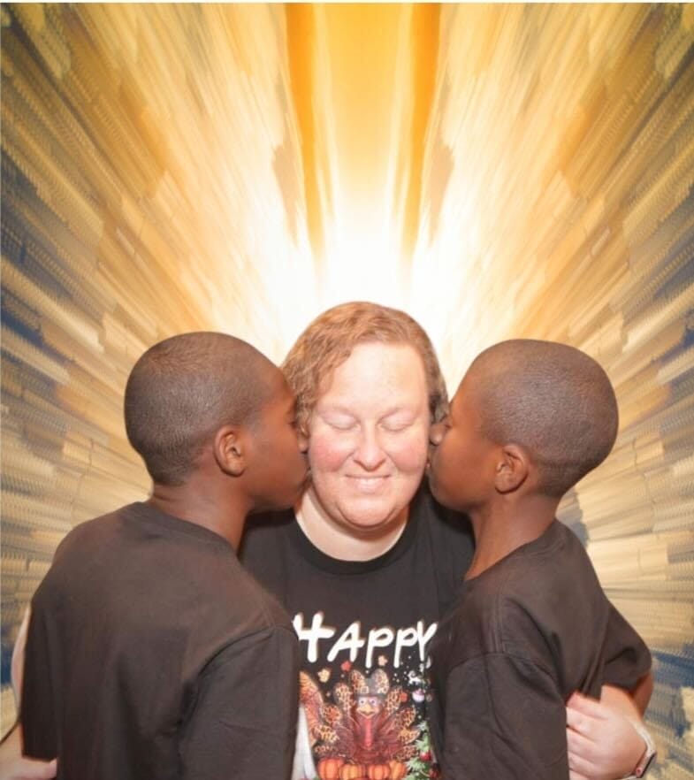 Photo shows Faye Adams with her two sons