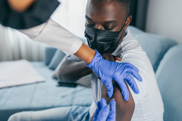 Photo shows doctor with patient