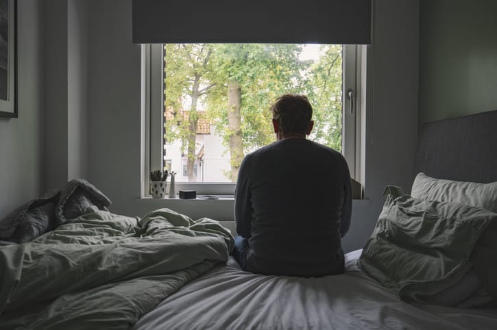 Photo shows man on bedside