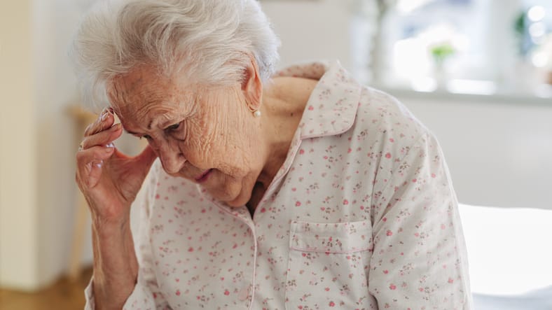 Photo shows older woman feels dizzy