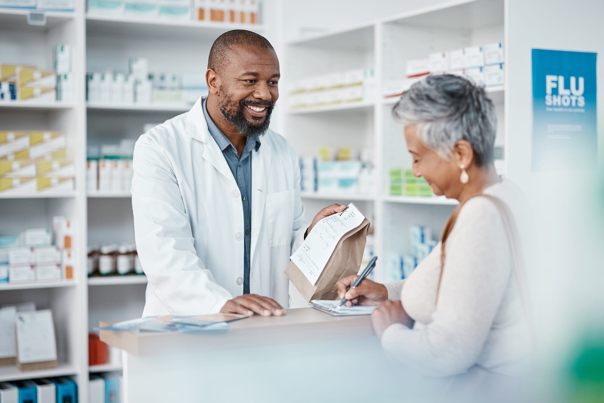 Healthcare, pharmacist and woman at counter with medicine at drug store.