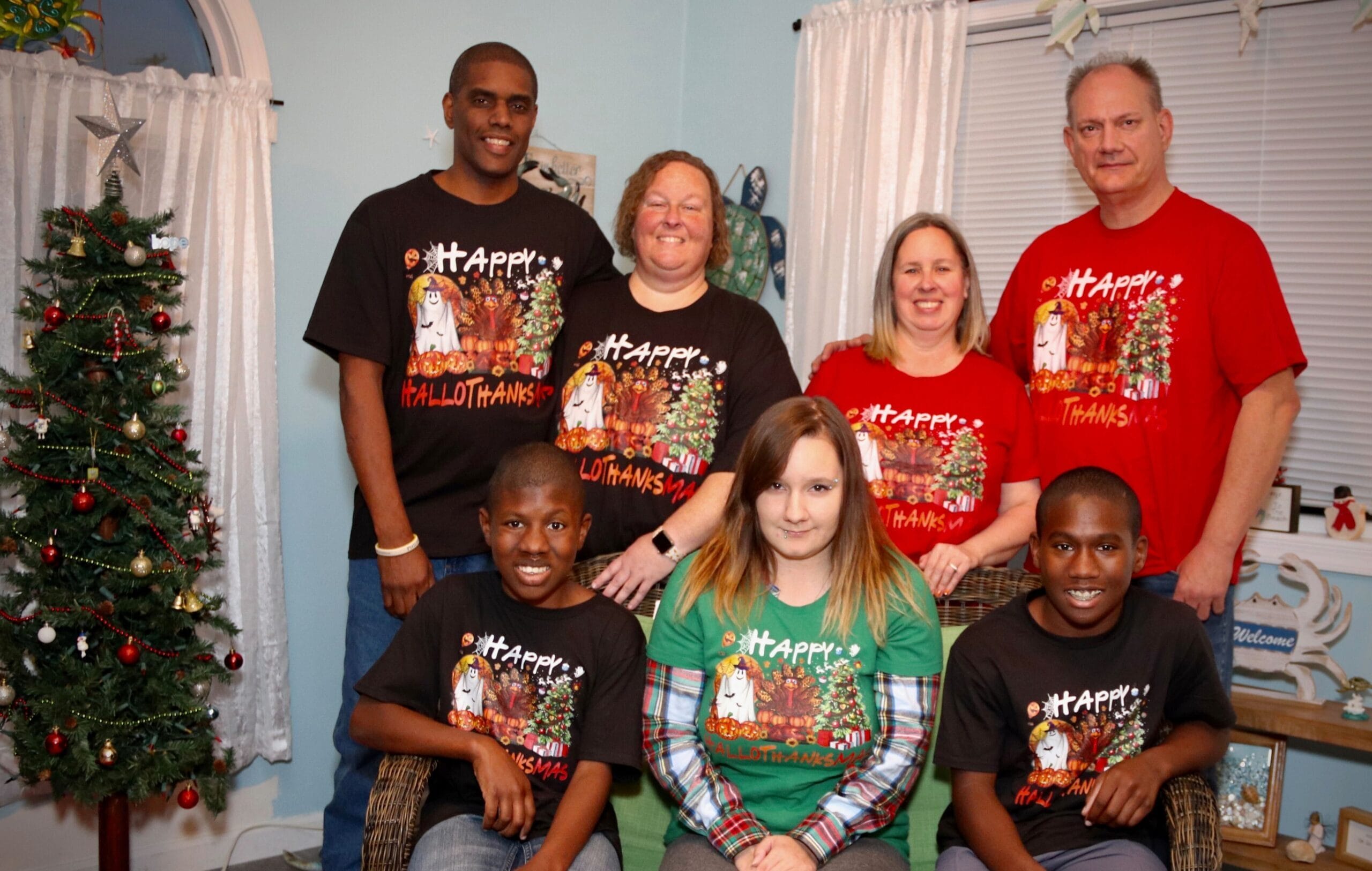 Faye Adams and family in their HallowThanksMas t-shirts