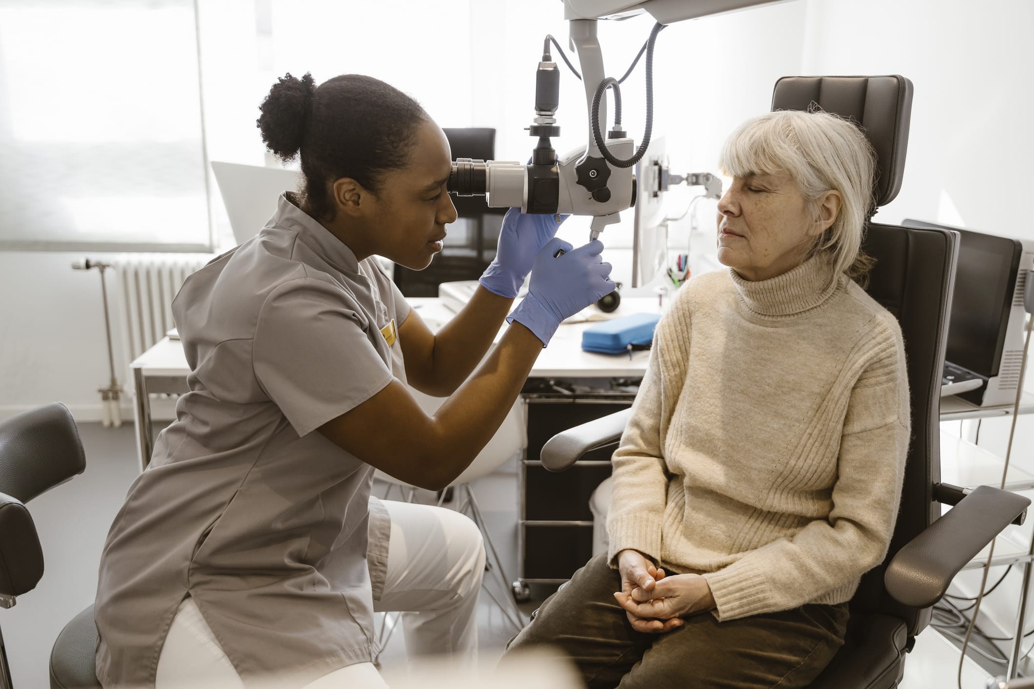 Older woman getting an eye exam